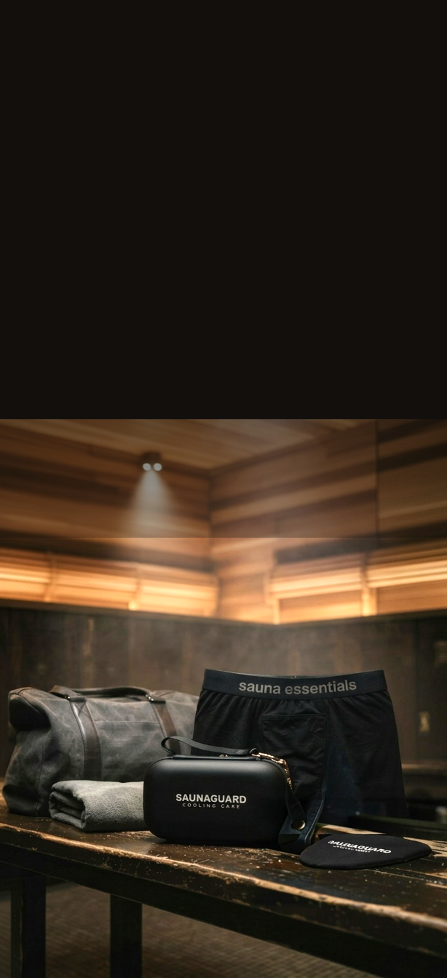 SaunaGuard cooling case, cotton brief, and travel bag arranged on a cedar bench inside a dimly lit sauna.